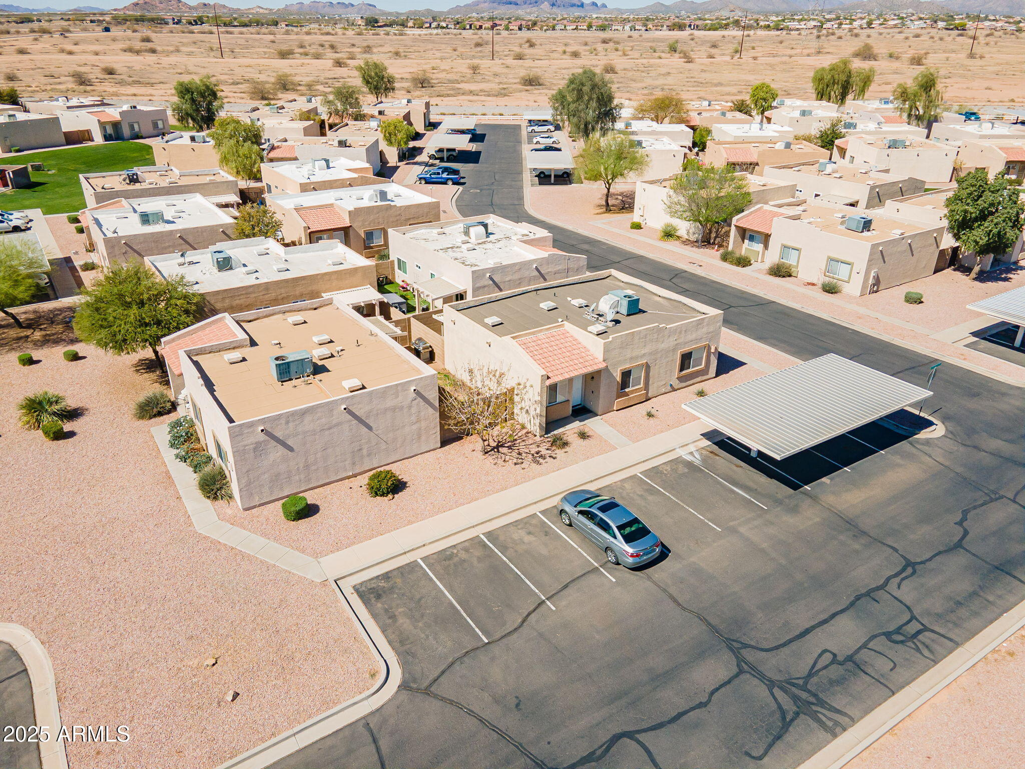 2300 East Magma Road, Unit 160 San Tan Valley, AZ 85143 - Photo 37 of 44 an aerial view of residential houses with outdoor space