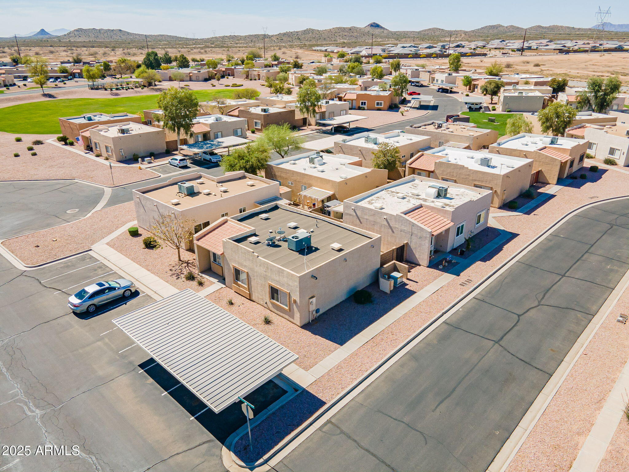 2300 East Magma Road, Unit 160 San Tan Valley, AZ 85143 - Photo 38 of 44 an aerial view of a city with lots of residential buildings