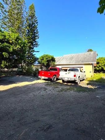 a car parked in front of a house