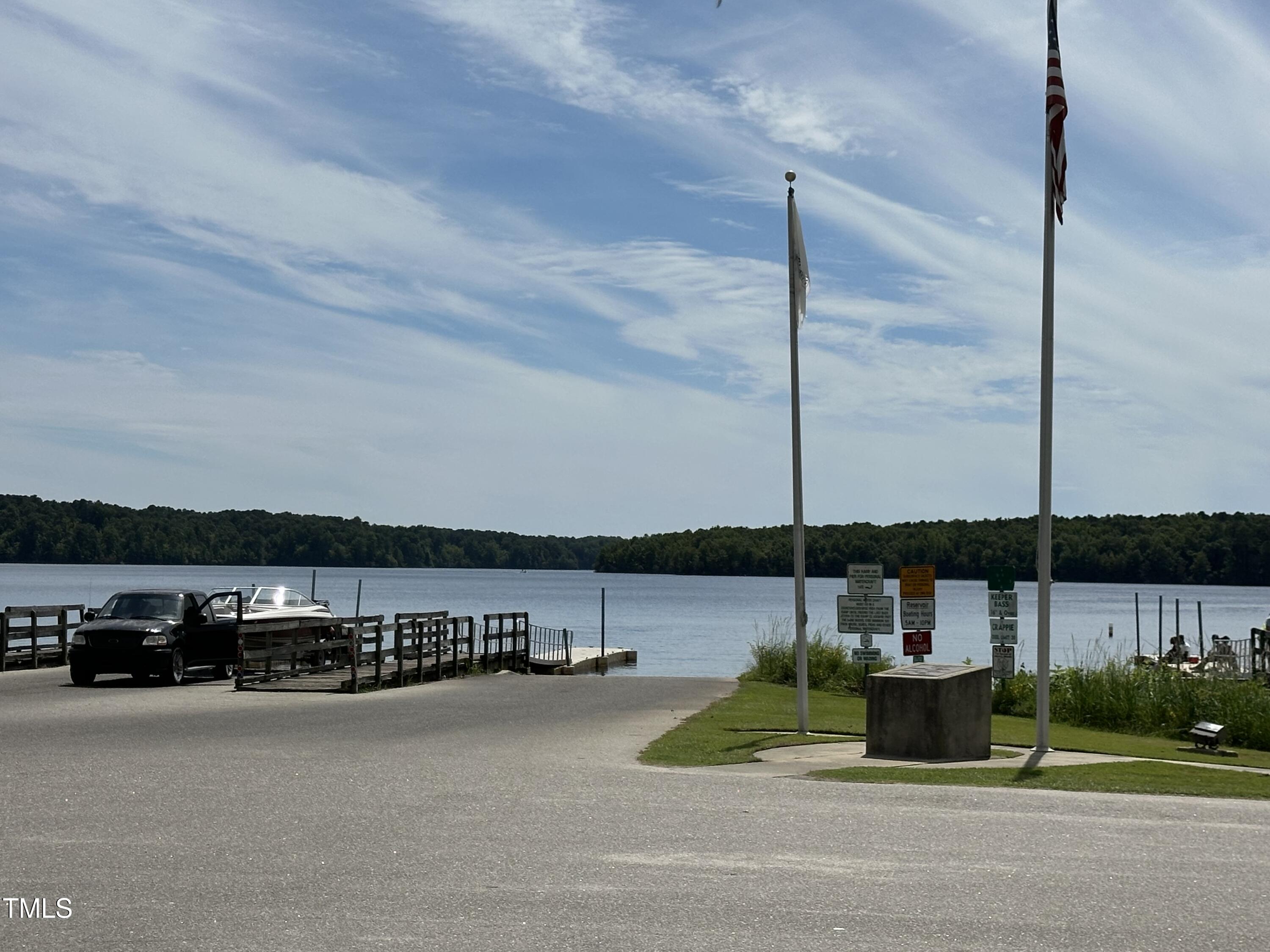 8404 Thomas Court Sims, NC 27880 - Photo 12 of 13 a view of a balcony with lake view and mountain view