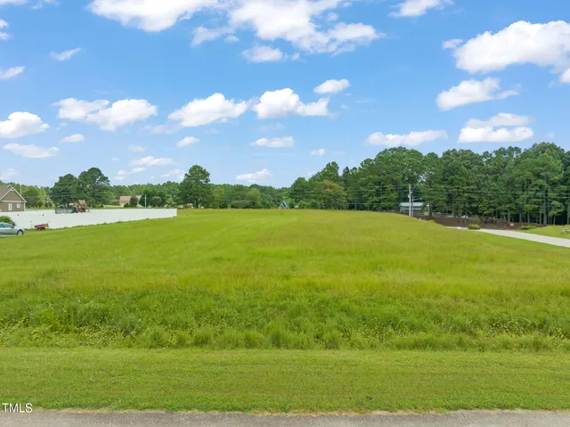 a view of a lake with a big yard