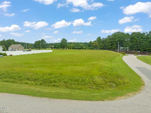 a sign broad on the side of the road
