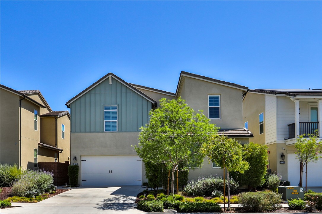 a house view with a outdoor space