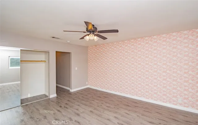 a view of workspace with wooden floor