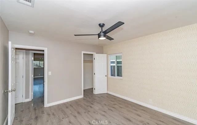 a view of a livingroom with a hardwood floor