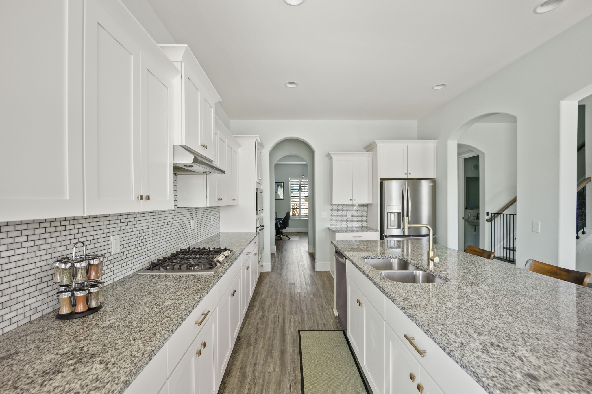 1008 Quillen Way Lebanon, TN 37087 - Photo 12 of 45 a kitchen with granite countertop a stove and cabinets