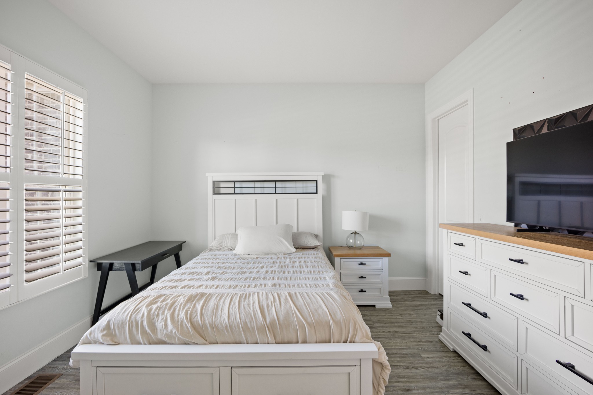 1008 Quillen Way Lebanon, TN 37087 - Photo 24 of 45 a bedroom with a bed and a flat screen tv