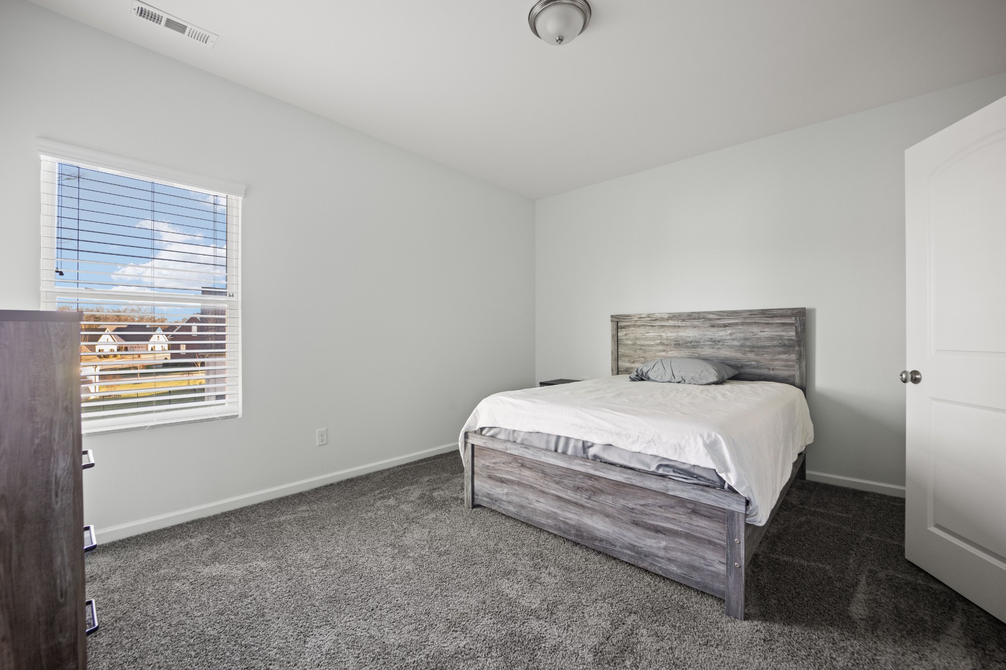 1008 Quillen Way Lebanon, TN 37087 - Photo 28 of 45 a bedroom with a bed and a window