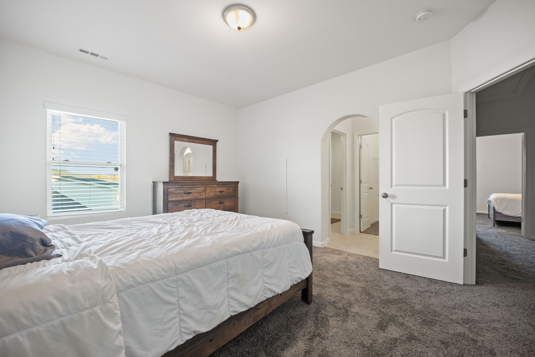 1008 Quillen Way Lebanon, TN 37087 - Photo 32 of 45 a bedroom with a bed and a cabinets