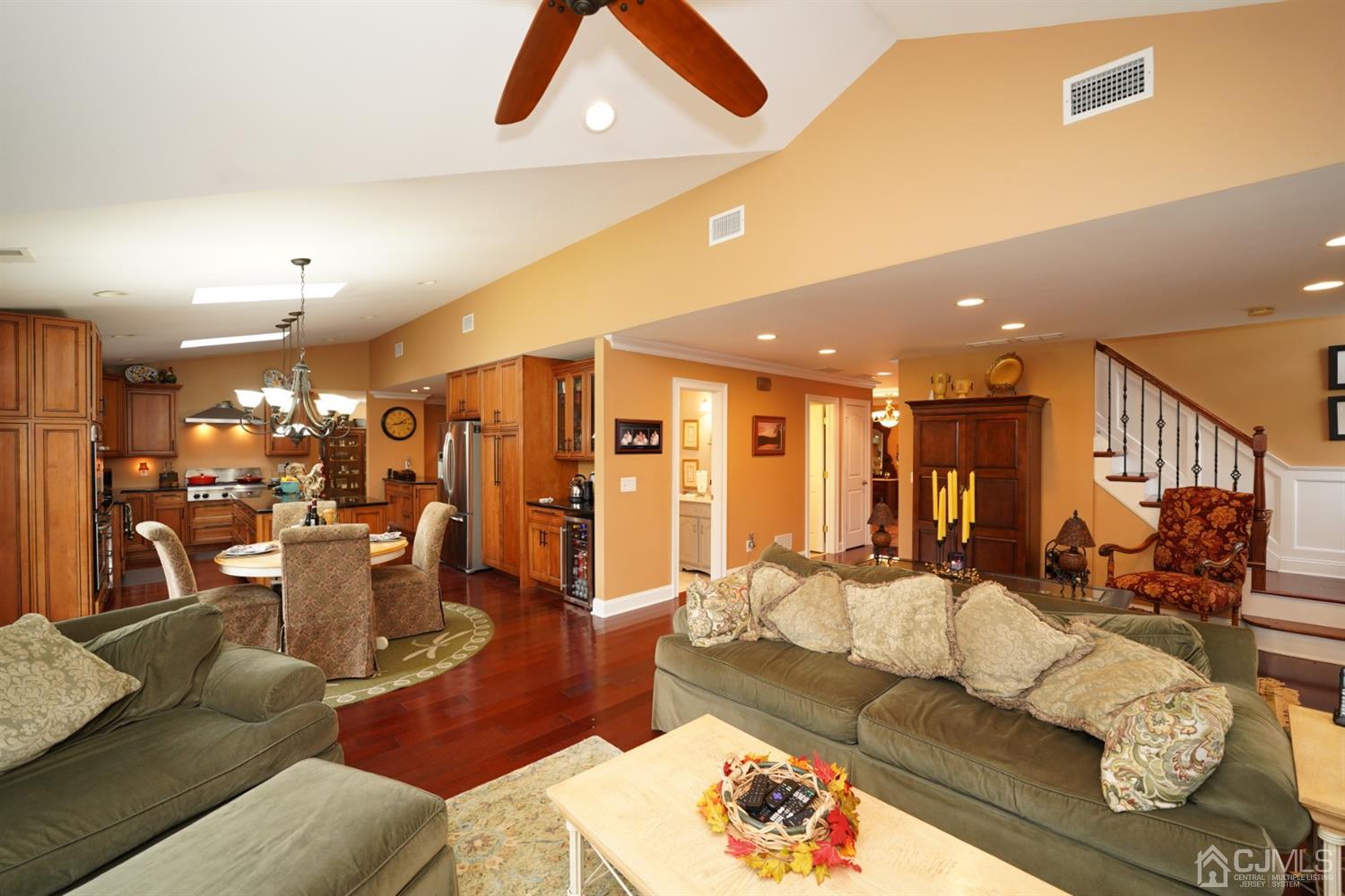 56 Kingsley Road Kendall Park, NJ 08824 - Photo 29 of 62 a living room with furniture and a large window