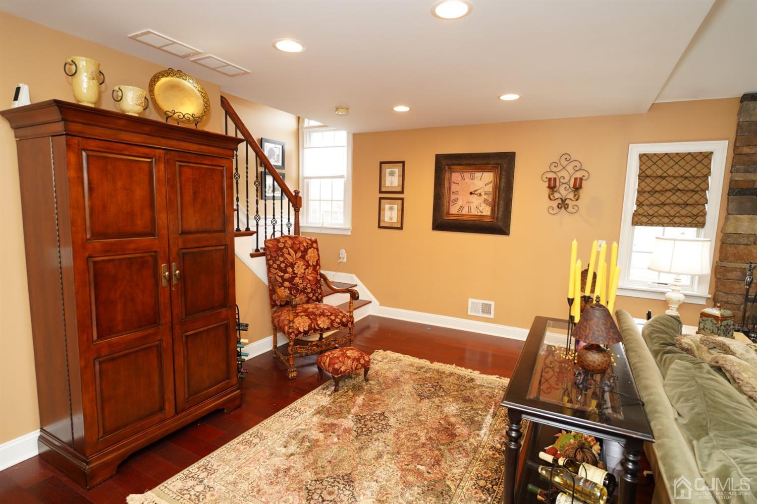 56 Kingsley Road Kendall Park, NJ 08824 - Photo 31 of 62 a living room with furniture and a window