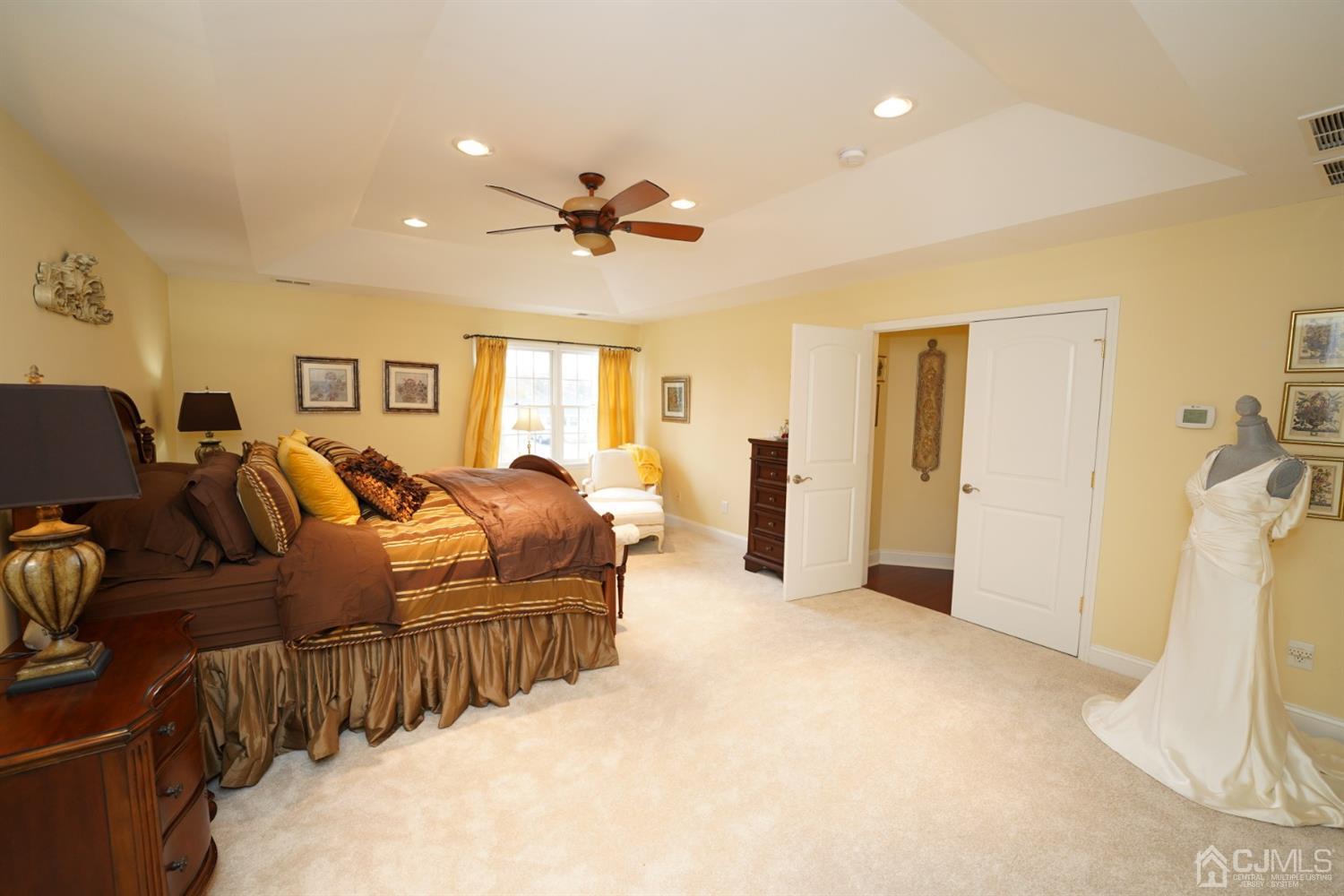 56 Kingsley Road Kendall Park, NJ 08824 - Photo 40 of 62 a bed room with furniture and a ceiling fan
