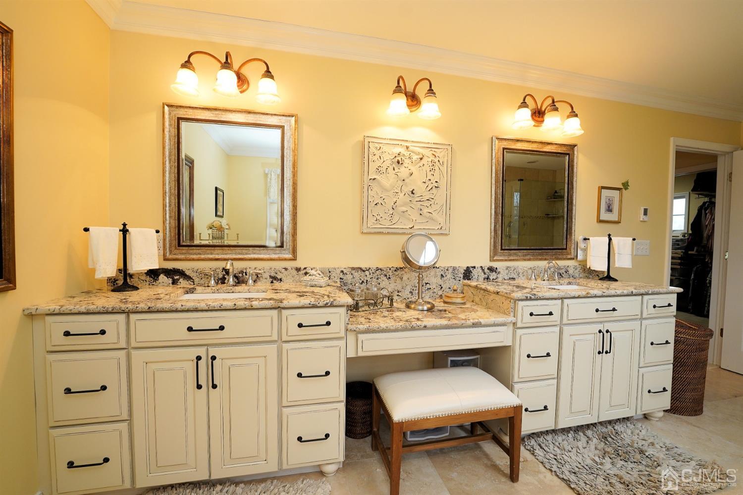 56 Kingsley Road Kendall Park, NJ 08824 - Photo 46 of 62 a spacious bathroom with a granite countertop sink and a mirror