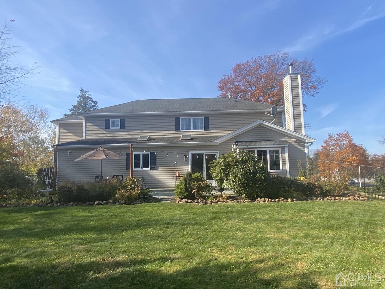 56 Kingsley Road Kendall Park, NJ 08824 - Photo 6 of 62 a front view of house with garden