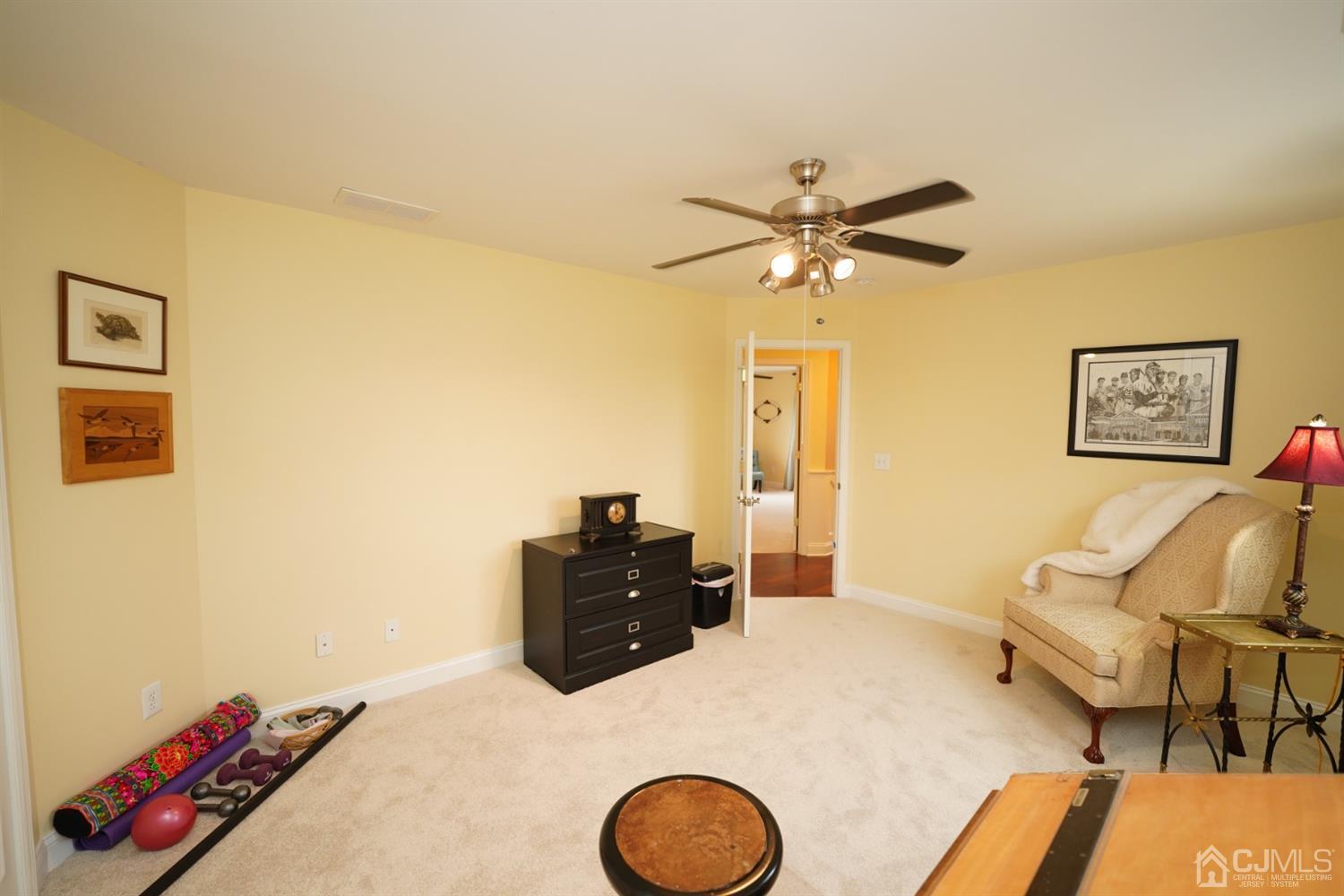 56 Kingsley Road Kendall Park, NJ 08824 - Photo 54 of 62 a living room with furniture