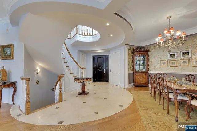 a view of a livingroom with furniture and chandelier