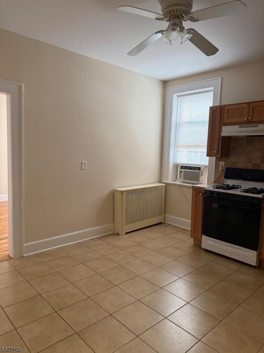 22 Baldwin Street, Unit 1 Montclair, NJ 07042 - Photo 11 of 22 a view of a kitchen with microwave and cabinets