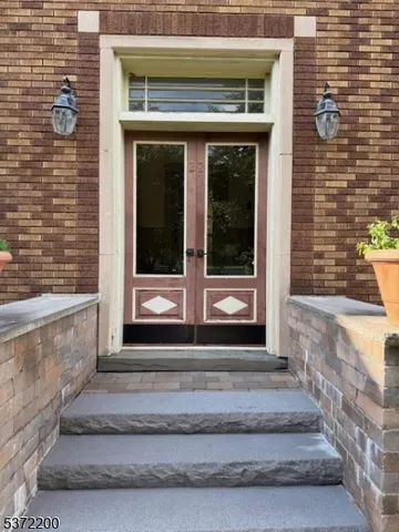 a front view of a house with a porch