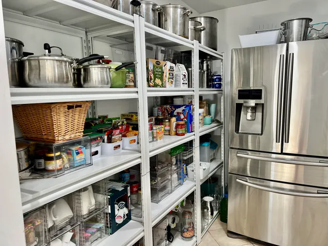 a bathroom with a toilet and a shower curtain