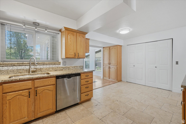 392 Perrine Drive Midvale, UT 84047 - Photo 10 of 37 Kitchen with entrance to sunroom
