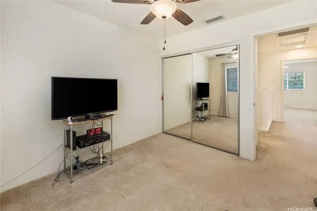 a view of a livingroom with a flat screen tv