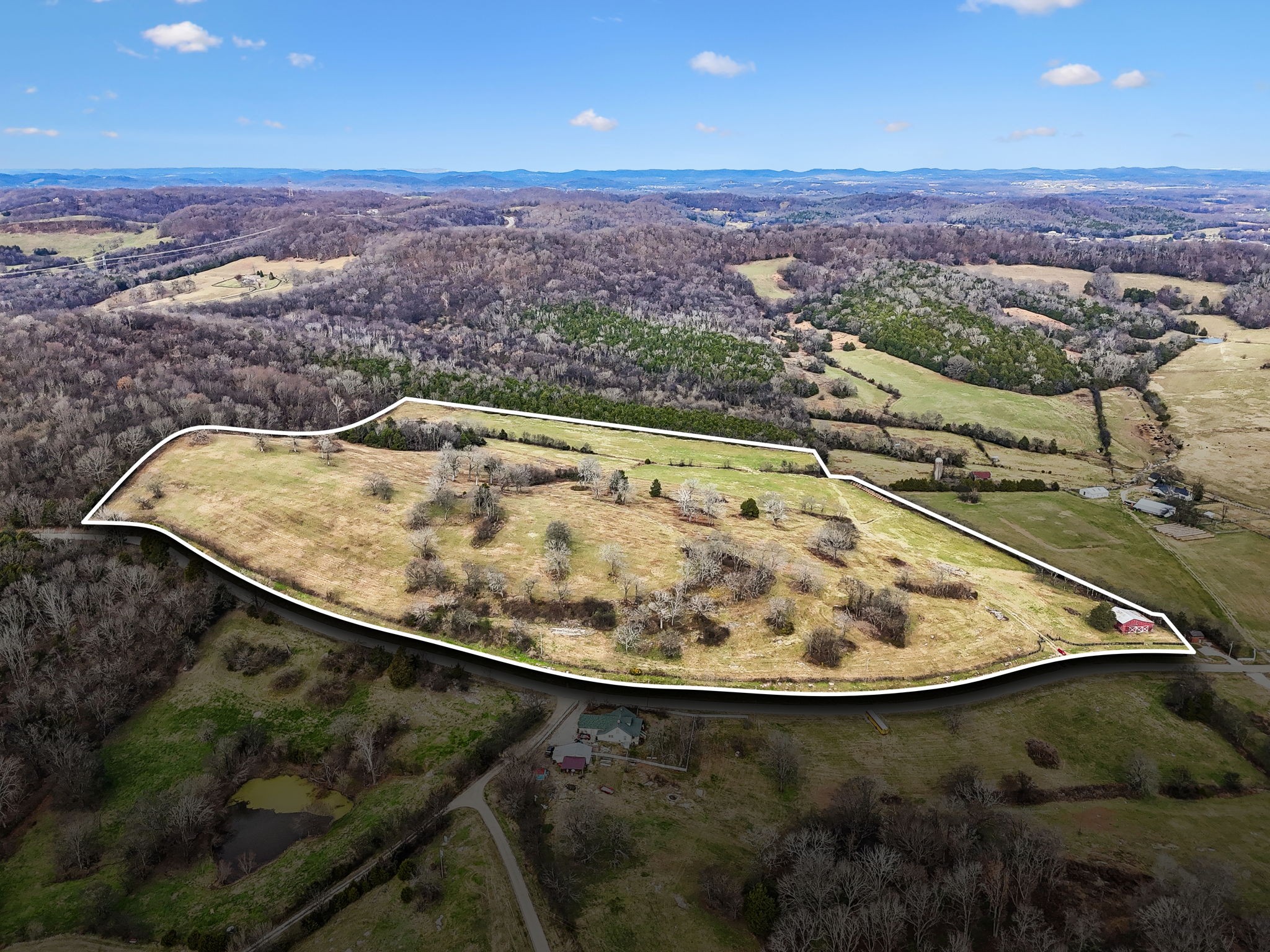 6884 Choctaw Road College Grove, TN 37046 - Photo 1 of 5 an aerial view of a house with a yard