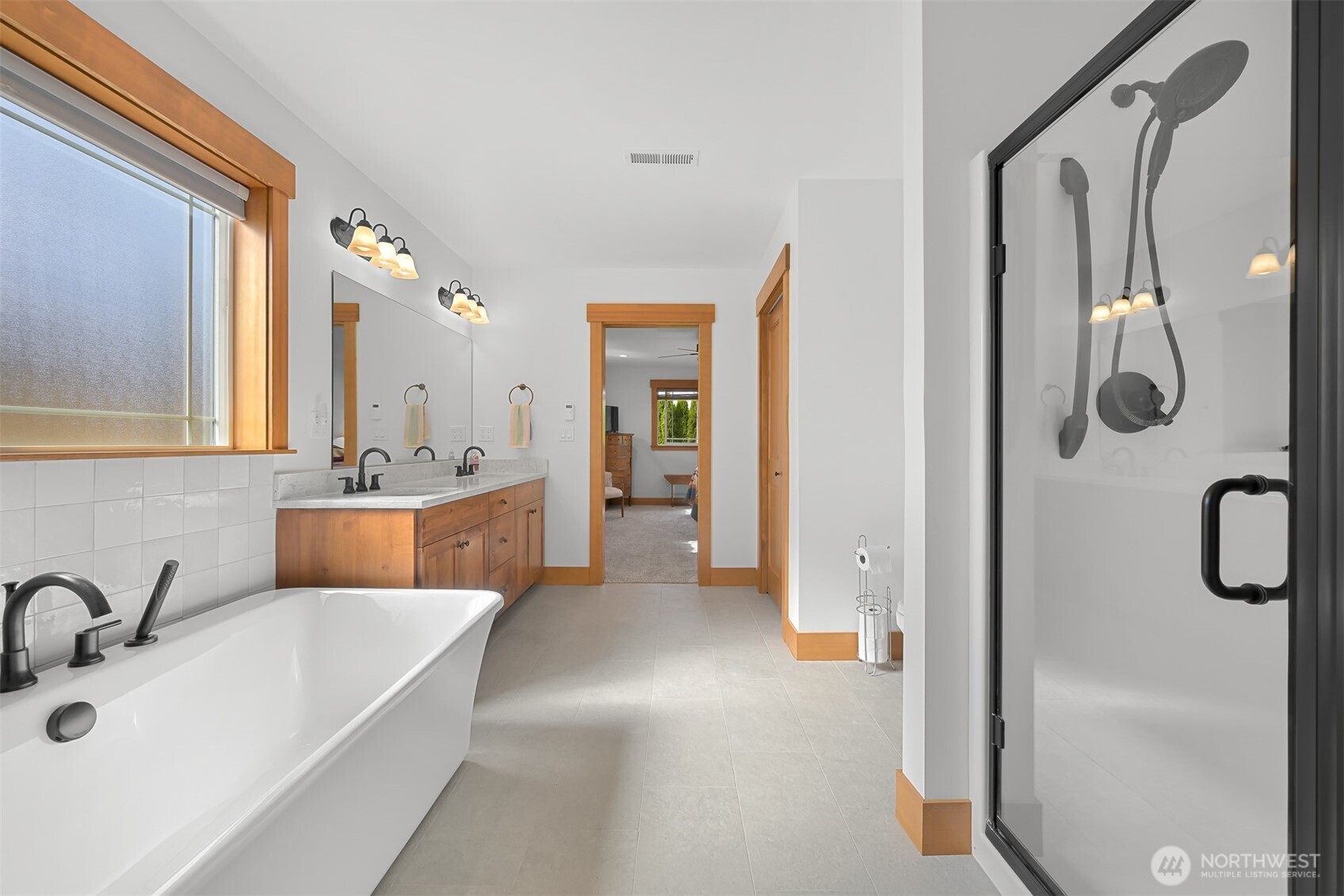 502 Westview Place Nooksack, WA 98276 - Photo 15 of 30 a bathroom with a tub sink and mirror