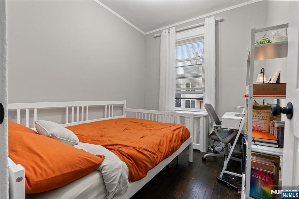 76 Mission Street Montclair, NJ 07042 - Photo 37 of 50 a bedroom with bed and wooden floor