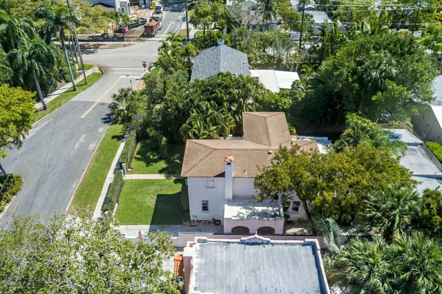an aerial view of a house with a garden