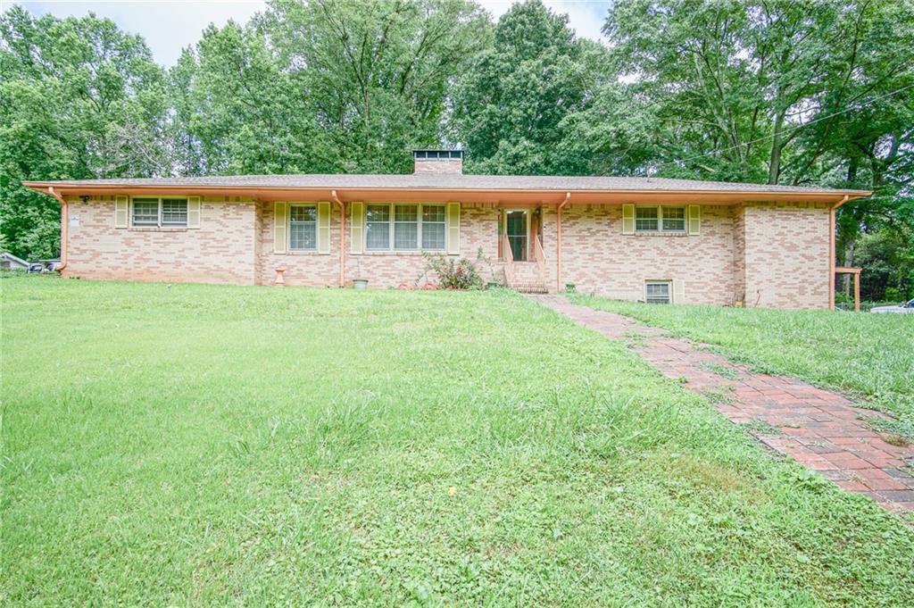 1831 Creveis Road Austell, GA 30168 - Photo 1 of 1 front view of a house with a yard