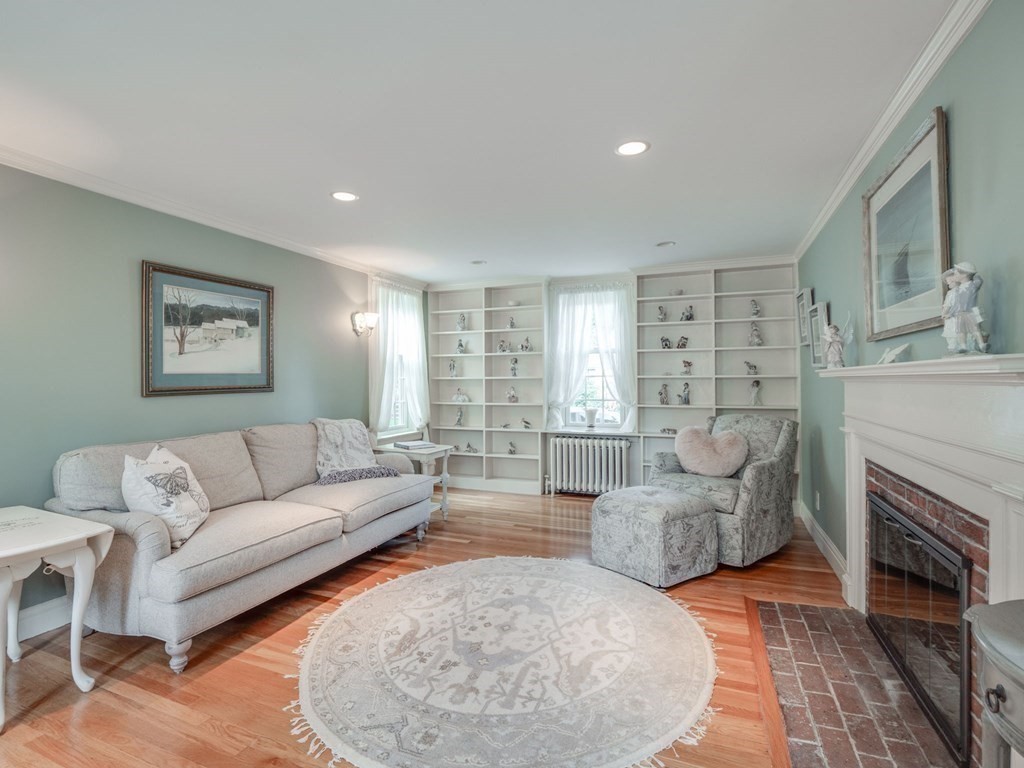 35 Pine Street Melrose, MA 02176 - Photo 14 of 38 a living room with furniture and a fireplace