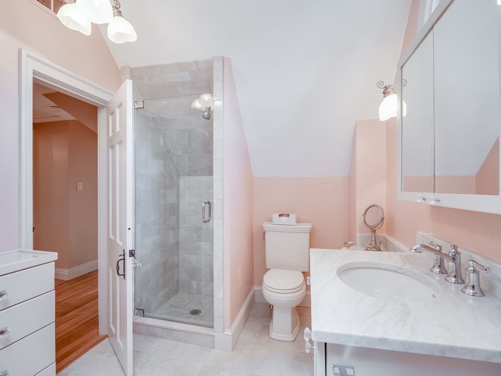 35 Pine Street Melrose, MA 02176 - Photo 17 of 38 a bathroom with a sink toilet and shower