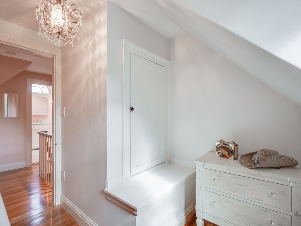 35 Pine Street Melrose, MA 02176 - Photo 20 of 38 a view of a hallway view with wooden floor and staircase