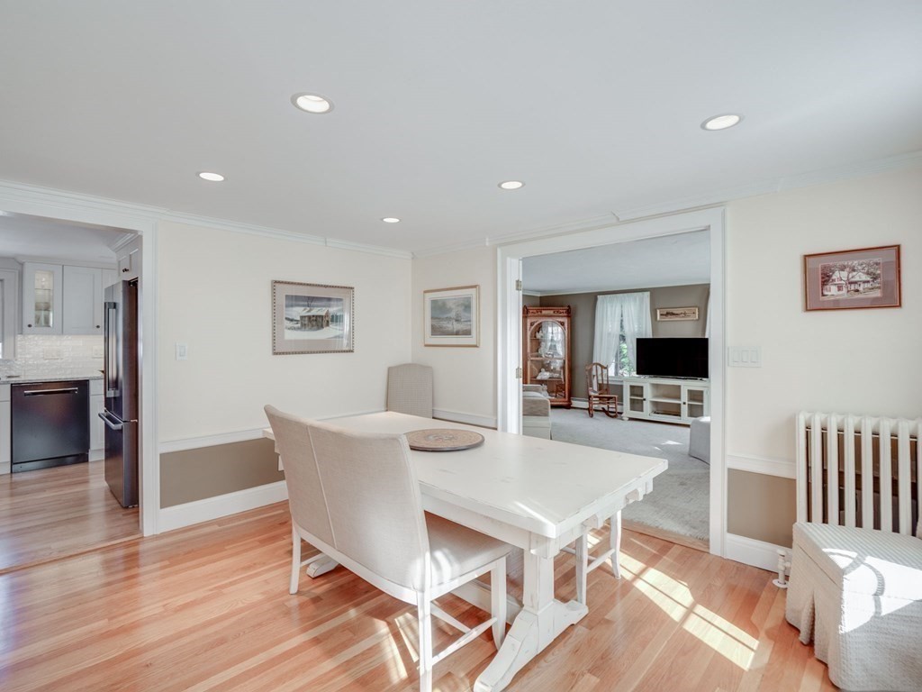 35 Pine Street Melrose, MA 02176 - Photo 2 of 38 a view of a dining room with furniture and wooden floor