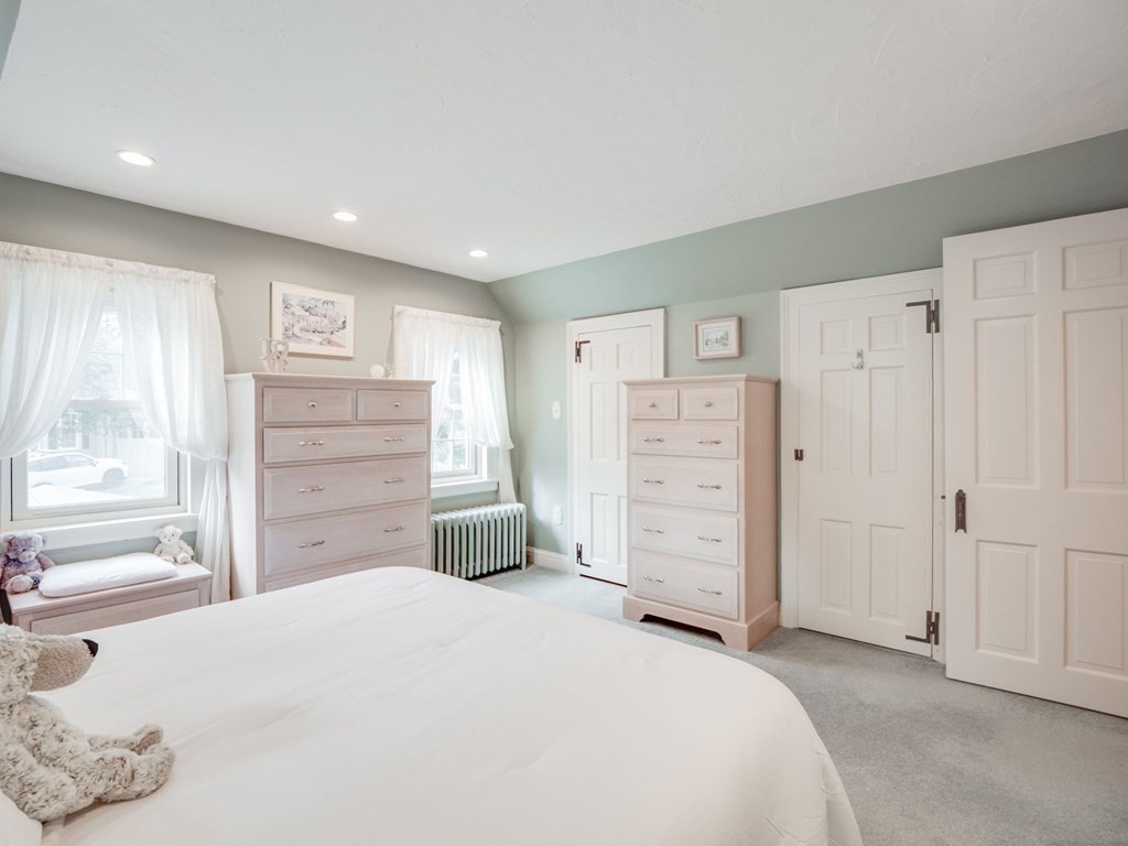 35 Pine Street Melrose, MA 02176 - Photo 22 of 38 a bedroom with a bed and a window