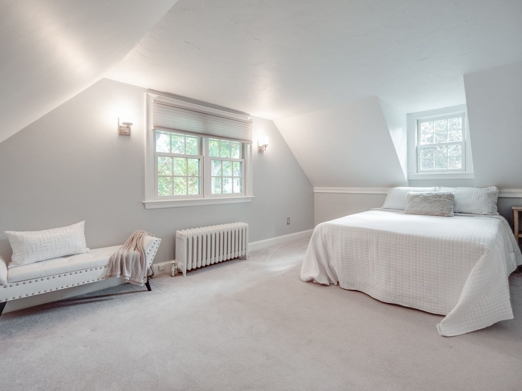 35 Pine Street Melrose, MA 02176 - Photo 26 of 38 a bedroom with a bed and a window