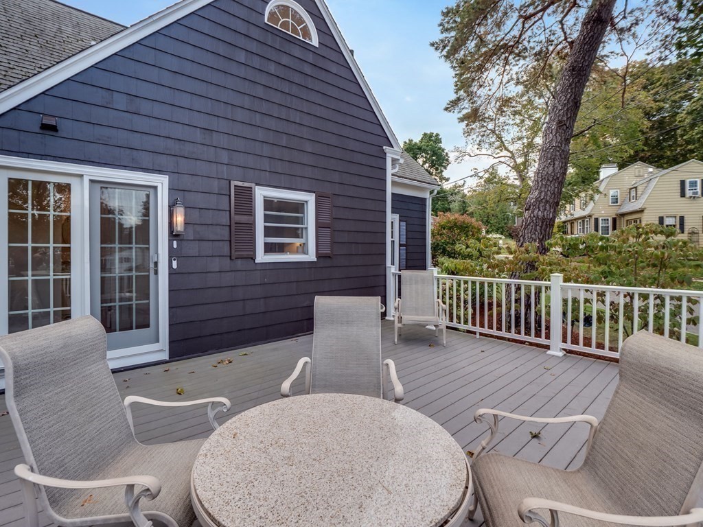 35 Pine Street Melrose, MA 02176 - Photo 29 of 38 a view of a patio with couches table and chairs and potted plants