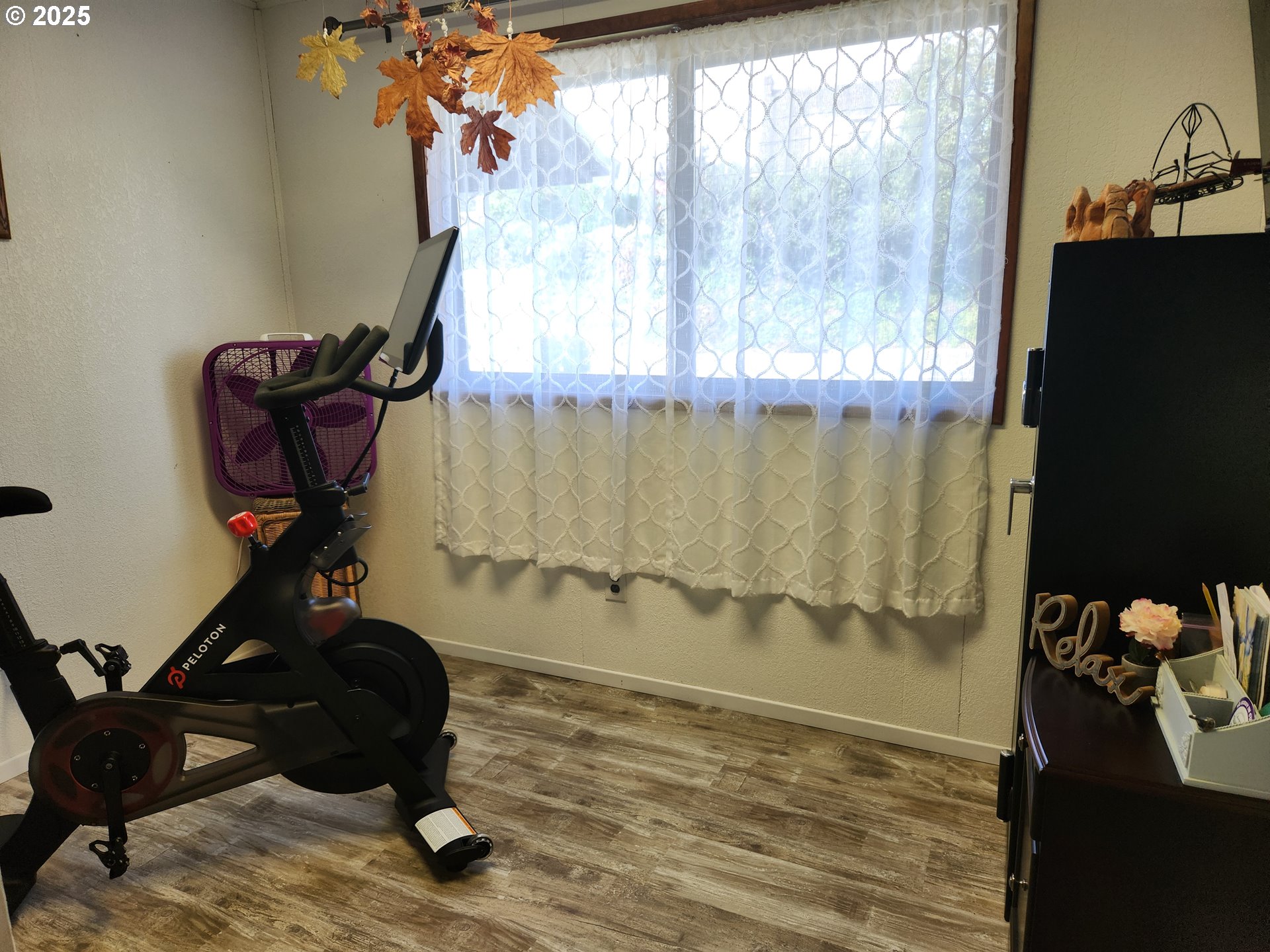 1144 Winchester Avenue Reedsport, OR 97467 - Photo 19 of 47 a view of a workspace with furniture and a window