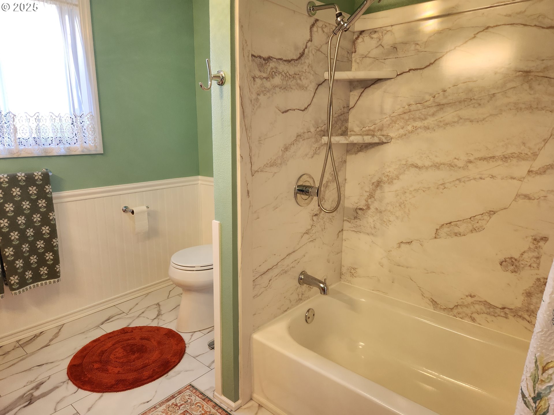 1144 Winchester Avenue Reedsport, OR 97467 - Photo 22 of 47 a bathroom with a toilet and a shower