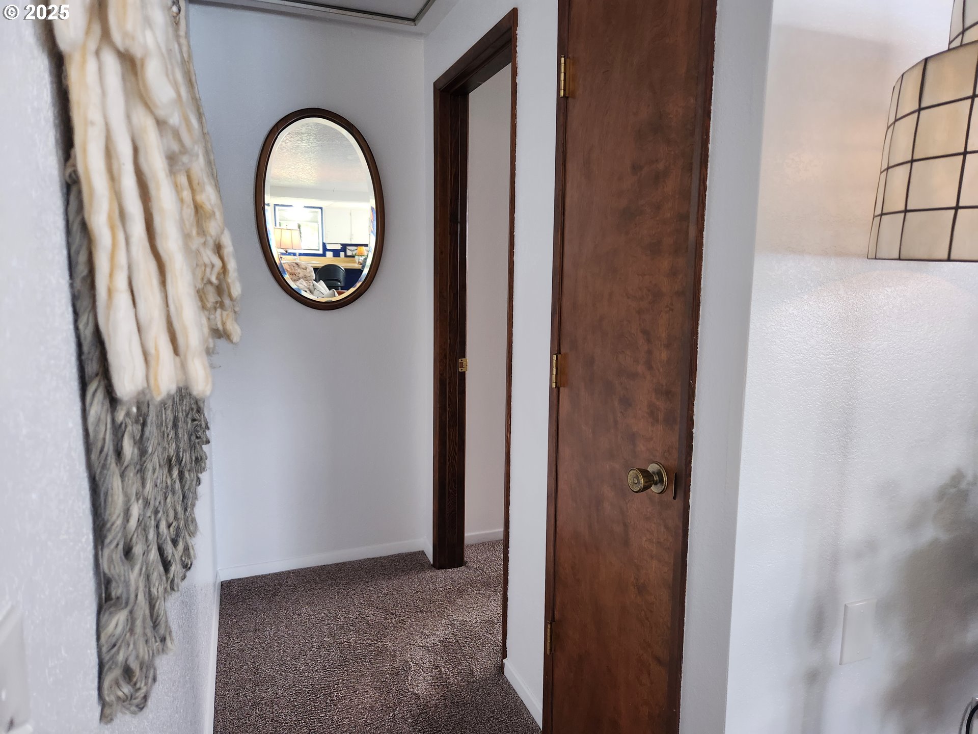 1144 Winchester Avenue Reedsport, OR 97467 - Photo 26 of 47 a view of a livingroom with wooden floor and a large window