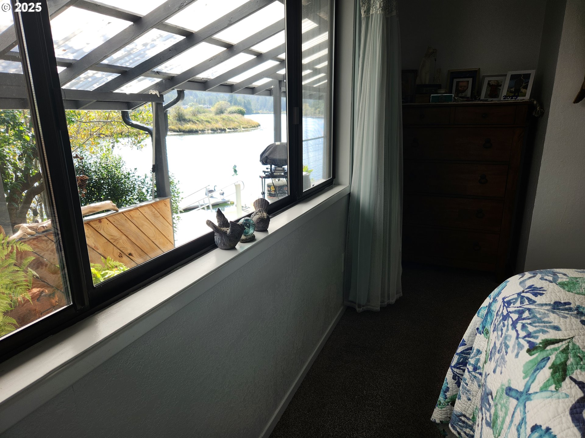 1144 Winchester Avenue Reedsport, OR 97467 - Photo 31 of 47 a view of a wooden floor and windows