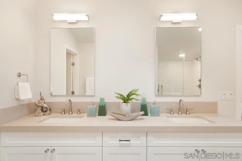 348 Walnut Avenue Carlsbad, CA 92008 - Photo 13 of 20 a bathroom with sink and mirror