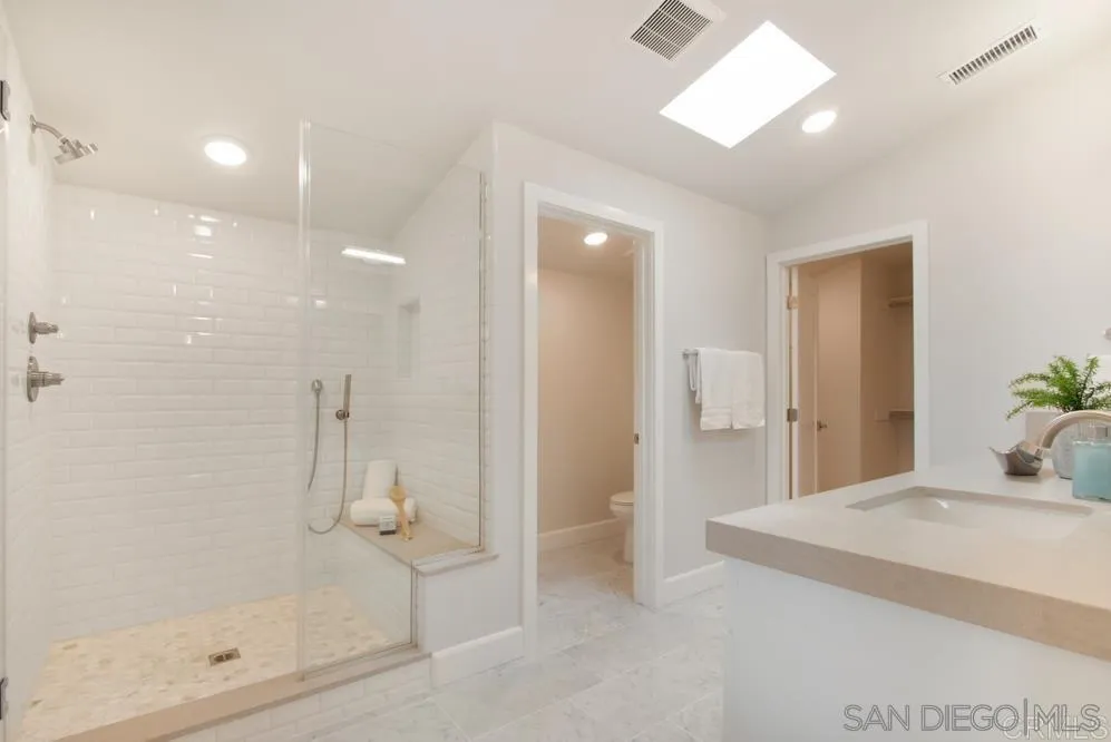 348 Walnut Avenue Carlsbad, CA 92008 - Photo 14 of 20 a bathroom with a shower