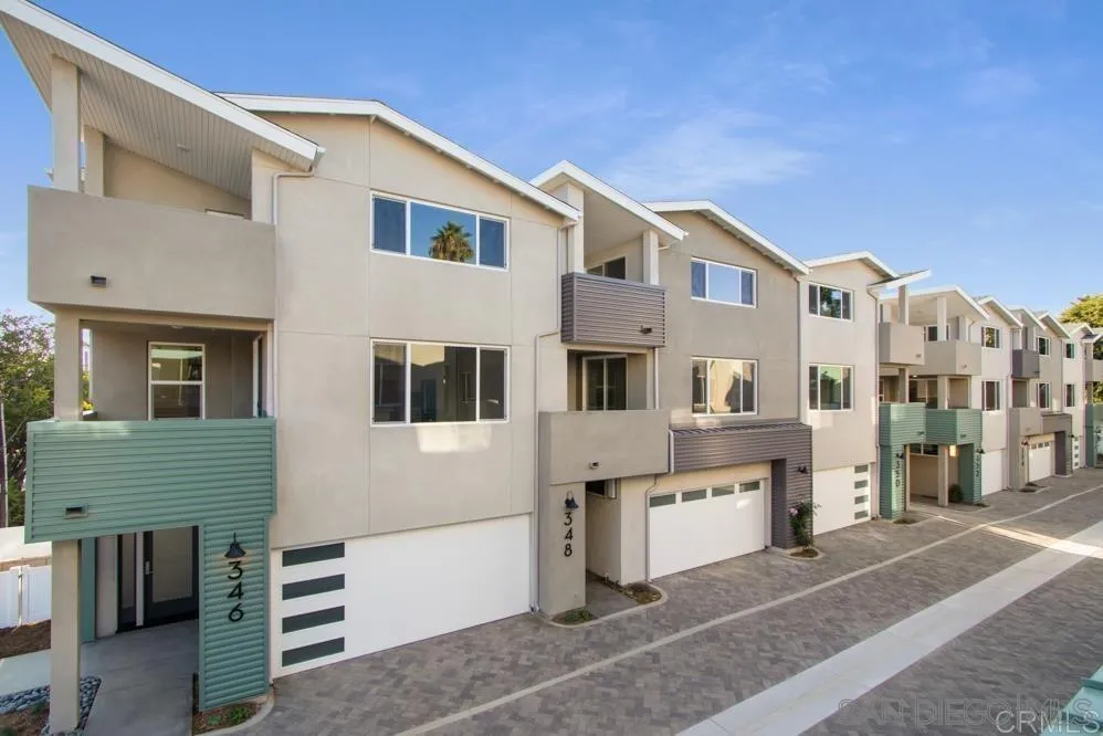 348 Walnut Avenue Carlsbad, CA 92008 - Photo 3 of 20 a large white building with a white roof