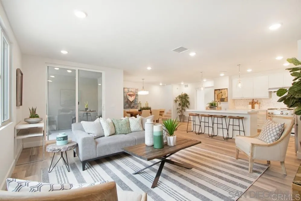 348 Walnut Avenue Carlsbad, CA 92008 - Photo 5 of 20 a living room with furniture and a table