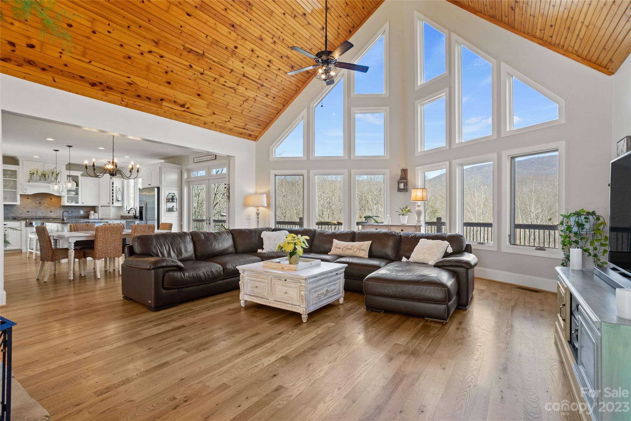340 Highland View Lane Mill Spring, NC 28756 - Photo 12 of 48 a living room with furniture and a large window