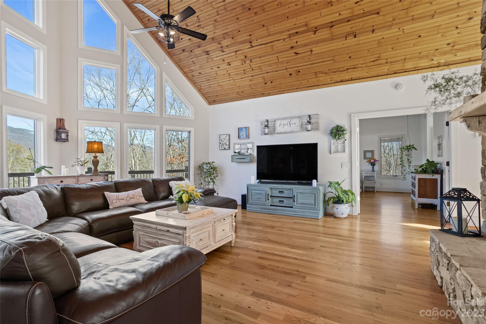 340 Highland View Lane Mill Spring, NC 28756 - Photo 13 of 48 a living room with furniture and a flat screen tv