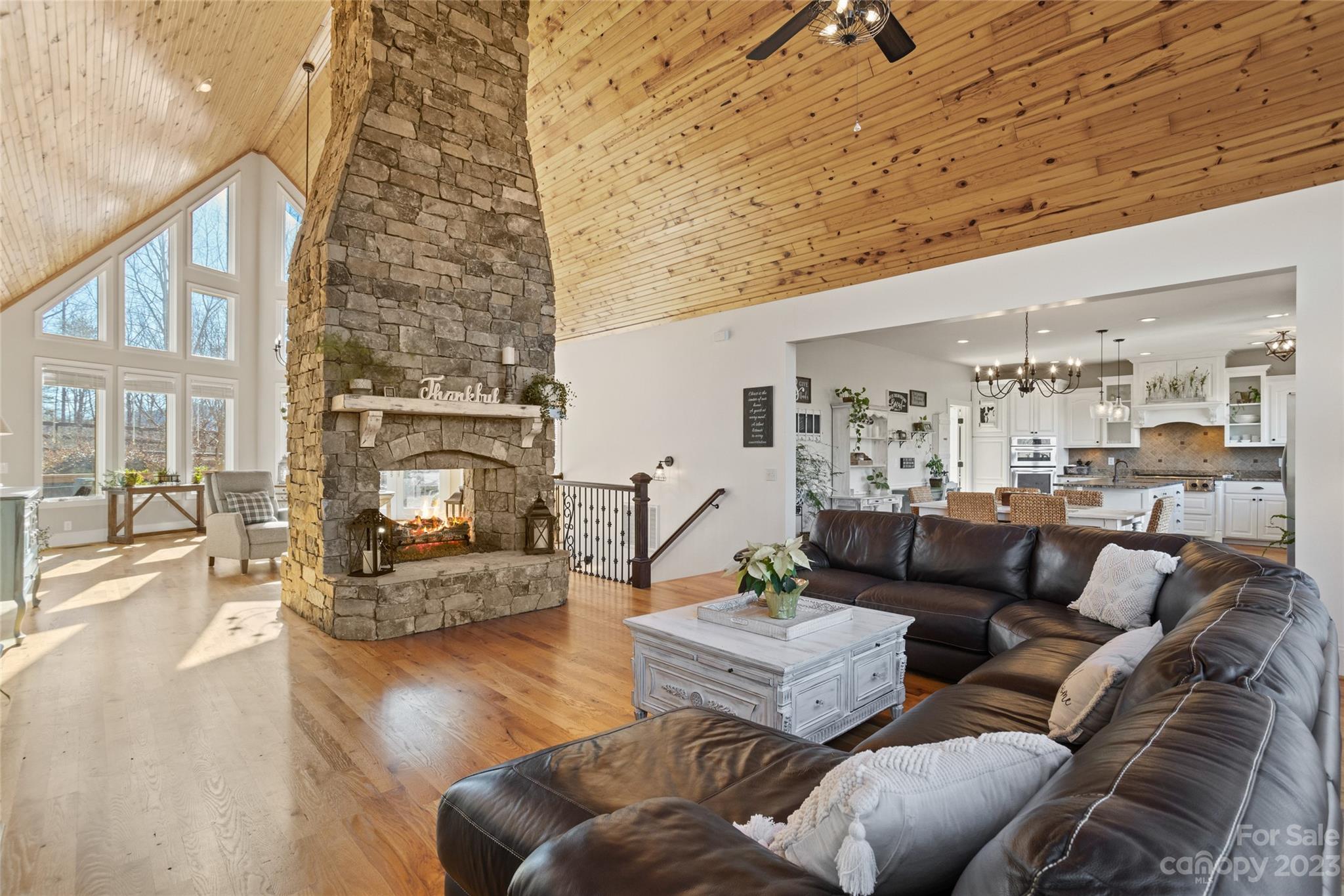 340 Highland View Lane Mill Spring, NC 28756 - Photo 14 of 48 a living room with furniture and a fireplace