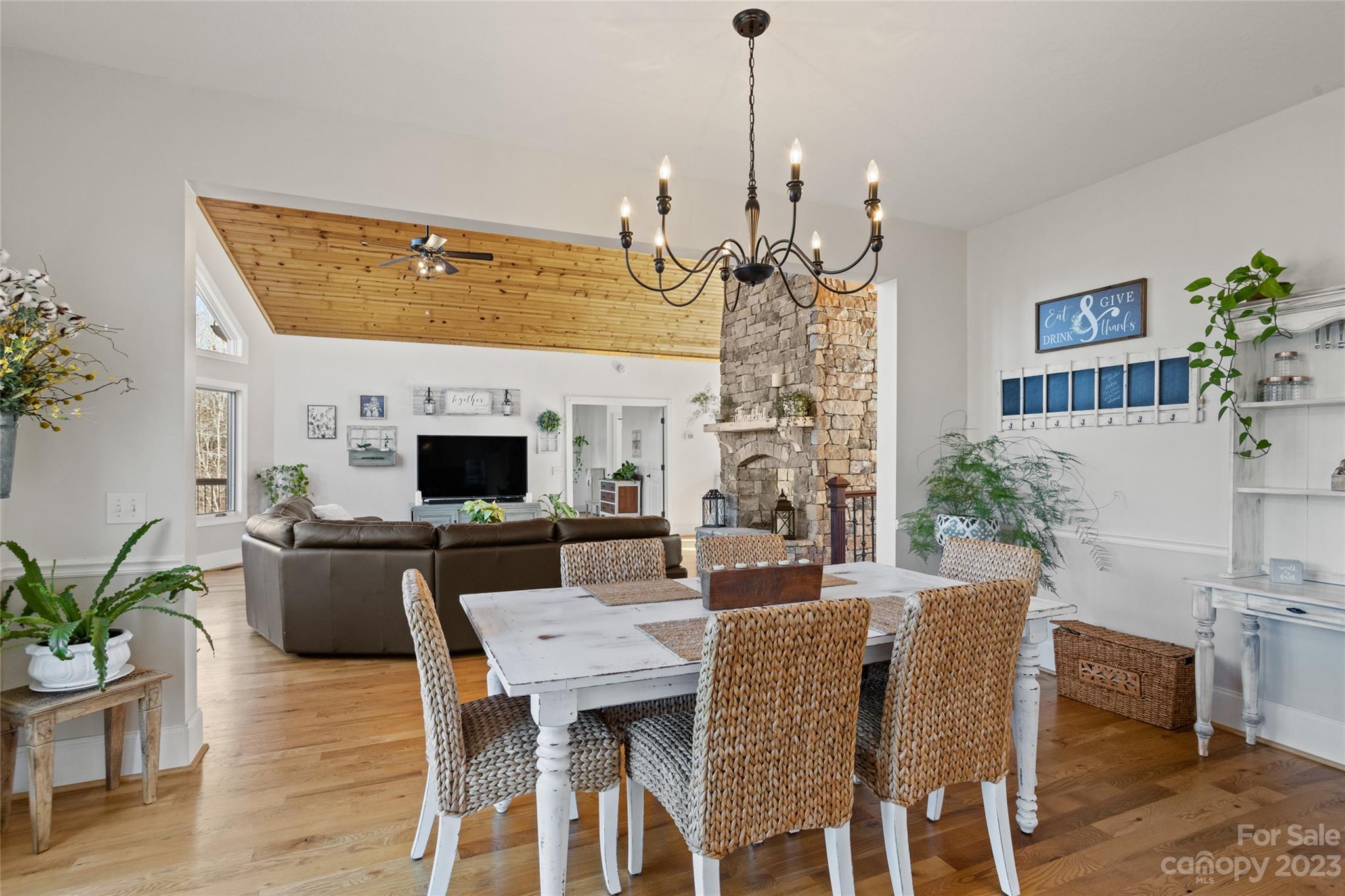 340 Highland View Lane Mill Spring, NC 28756 - Photo 19 of 48 a view of a dining room with furniture and wooden floor