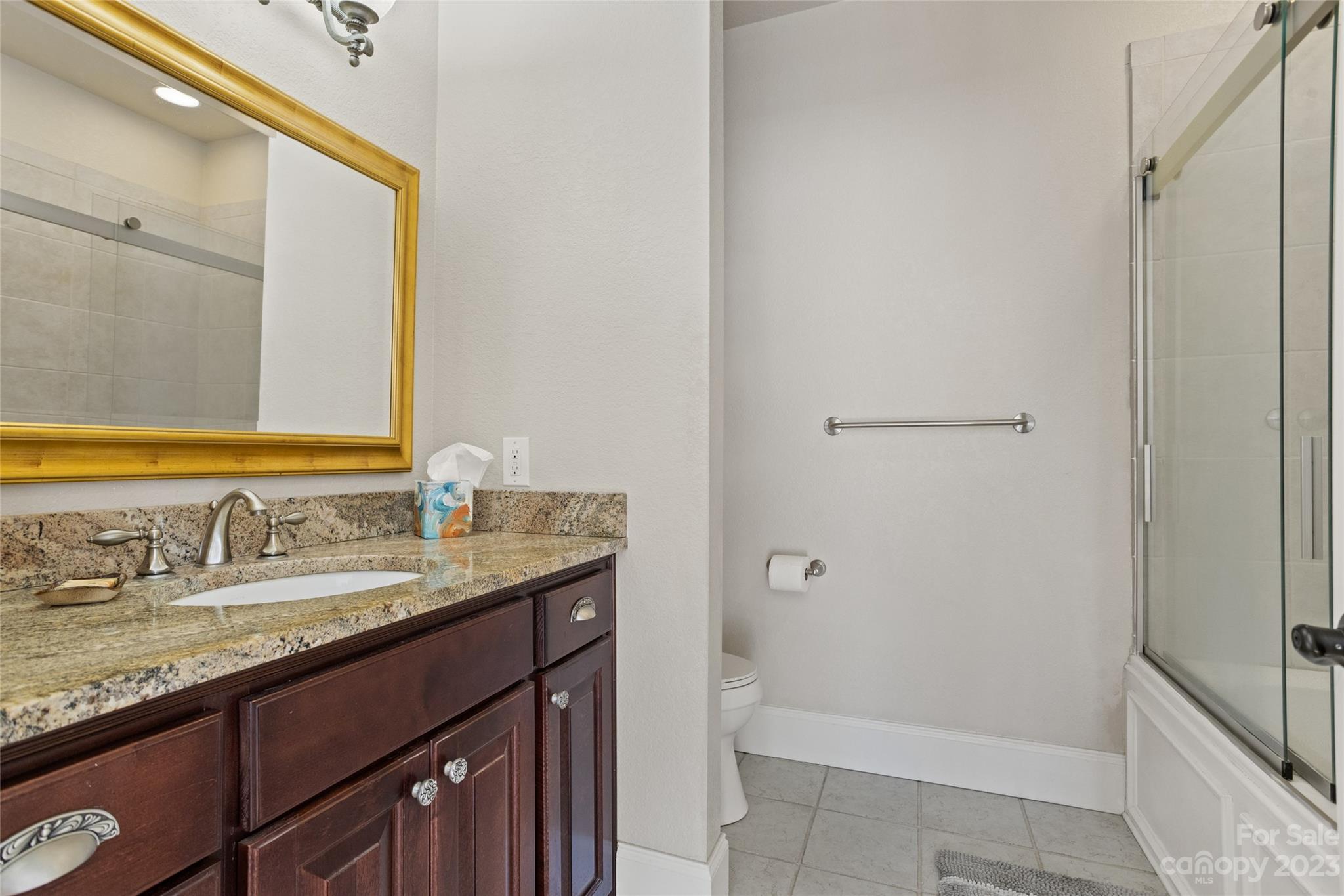 340 Highland View Lane Mill Spring, NC 28756 - Photo 27 of 48 a bathroom with a granite countertop sink and a mirror